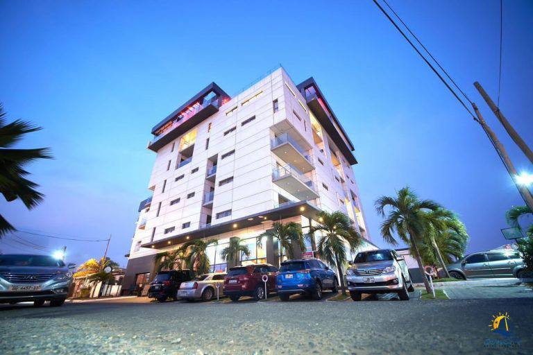 A car is parked on the side of a street